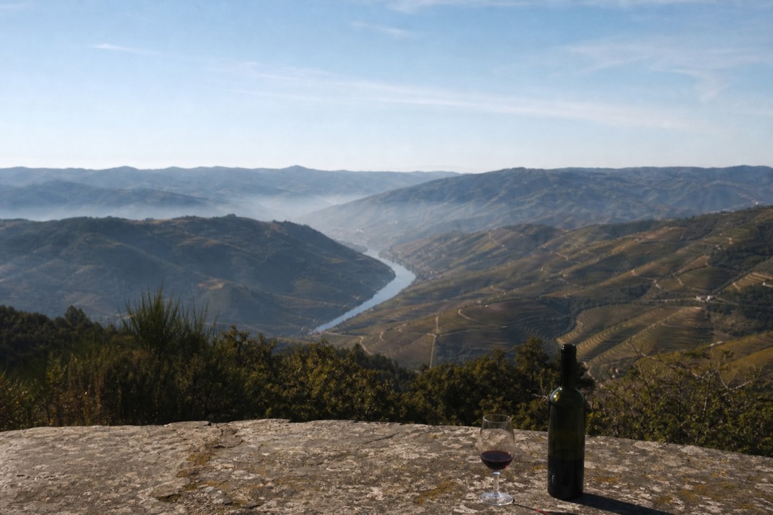 High panoramic view from Sao Leonardo de Galafura with the Douro river snaking far below terraced slopes