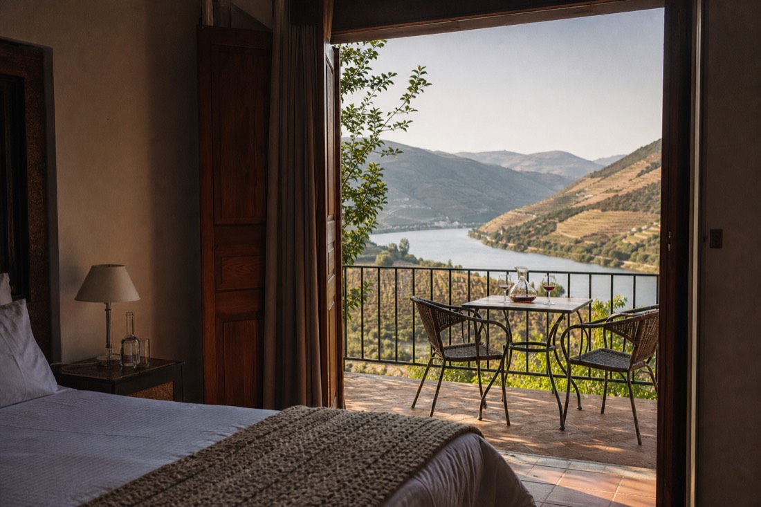 Boutique estate room and a dining terrace overlooking the Douro river near Pinhao