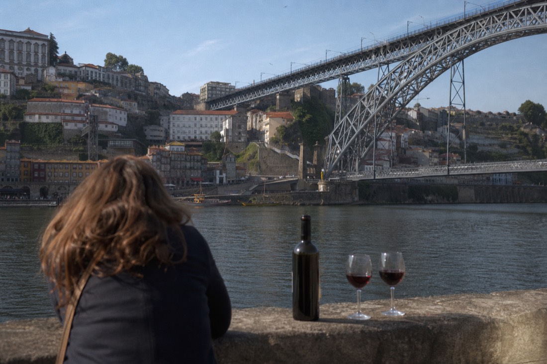 View from the Gaia lodges across the Douro to the old town of Porto with the double-deck iron bridge