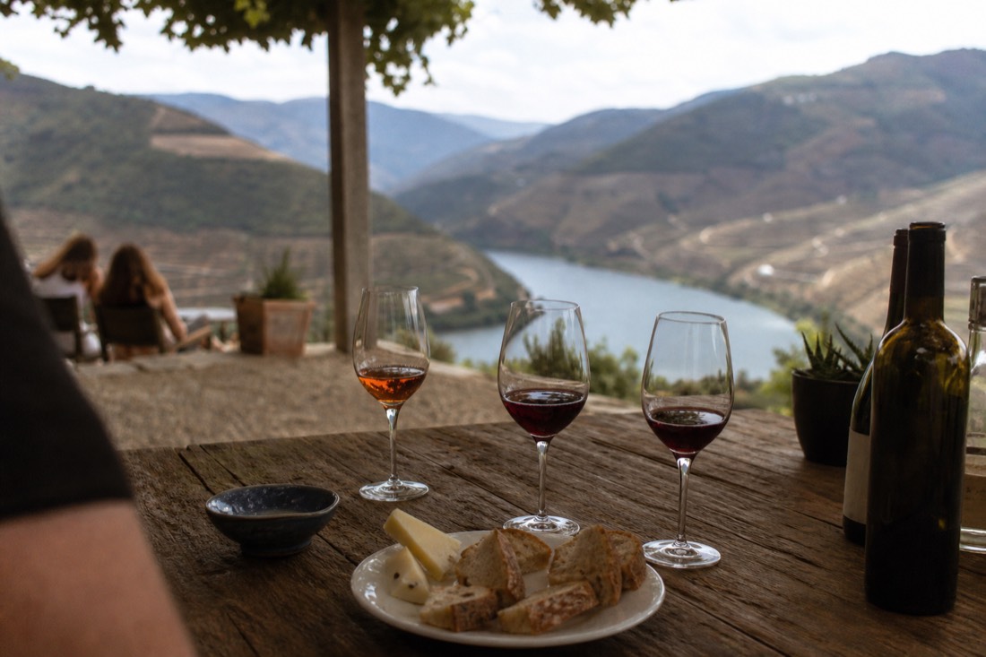 Port and DOC Douro wines poured for a tasting on a quinta terrace above the Douro River